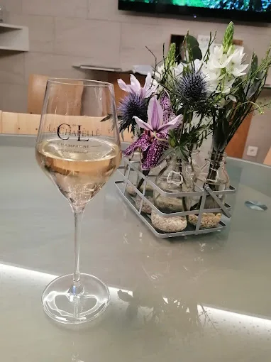 A glass poured in the Cl. de la Chapelle tasting room