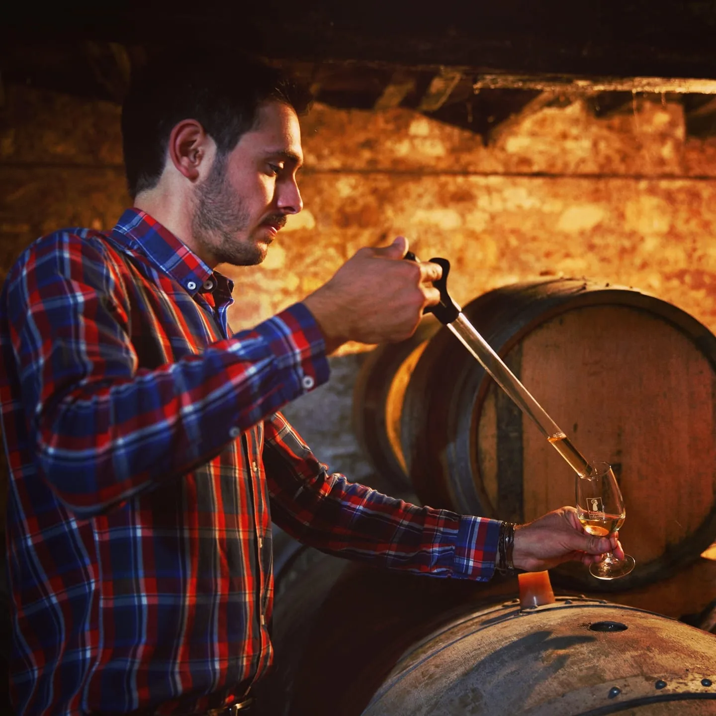 Fabien Bergeronneau drawing a sample from barrel