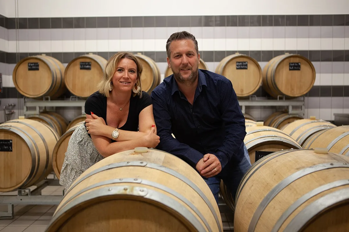 Romain and Cindy Tribaut in the barrel cellar at Romery